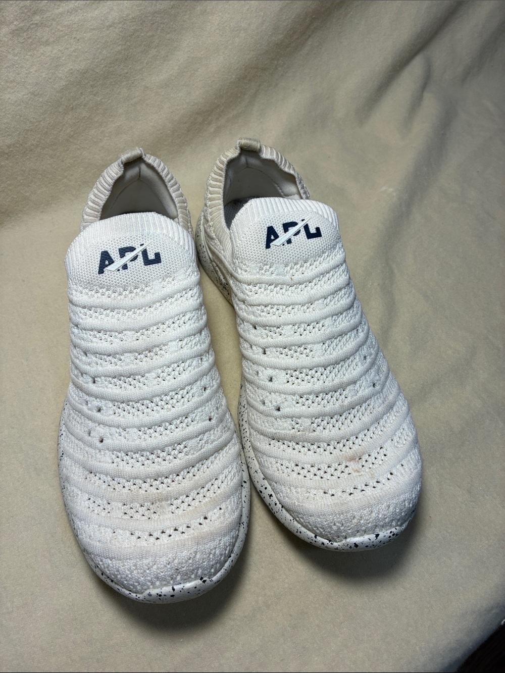 APL Women's Slip-On TechLoom Knit Sneakers in White with Navy Logo